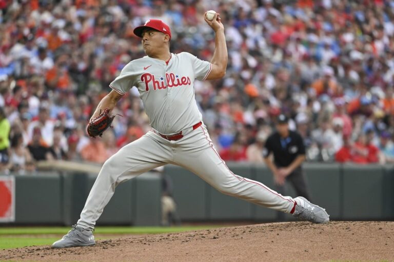 Phillies outlast Orioles in 11th after long rain delay
