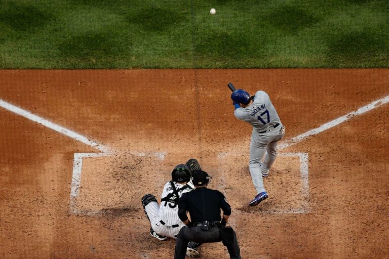 Dodgers stun Rockies with seven-run ninth inning