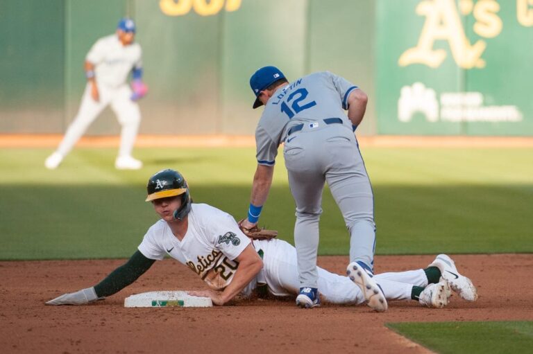 A's snuff late rally, edge Royals