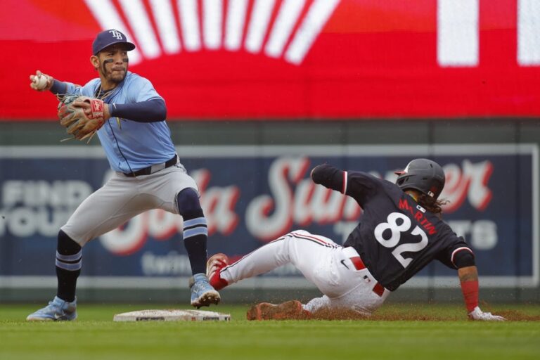 Jonny DeLuca, Rays stave off Twins in 10 innings