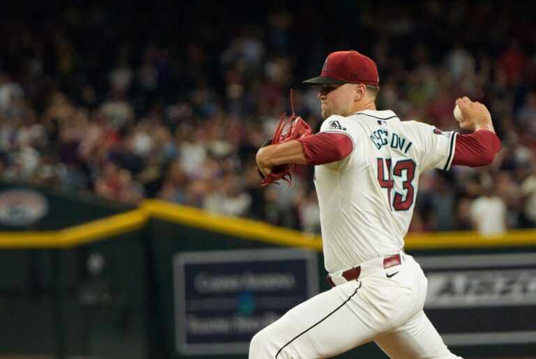 A's hit four homers to roll past D-backs, end road skid