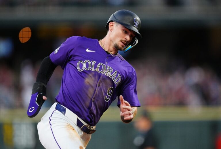 Rockies emerge with 10-inning win over Brewers