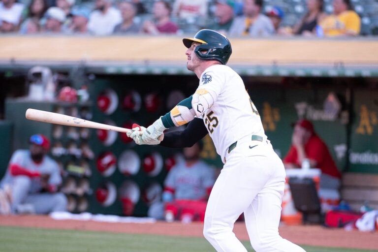 A's use two big innings to topple Angels