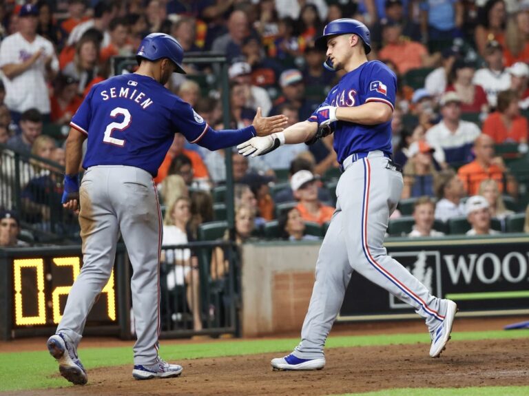 Home runs propel surging Astros past Rangers