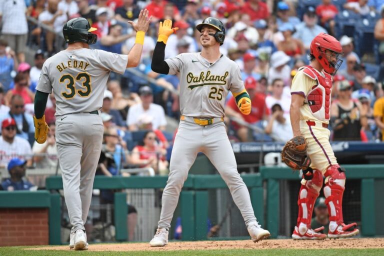 A's tie franchise record with 8 HRs, crush Phillies 18-3